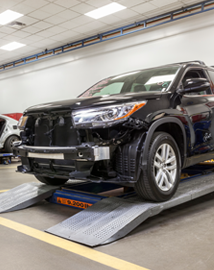 Toyota on vehicle lift | Space City Toyota in Humble TX