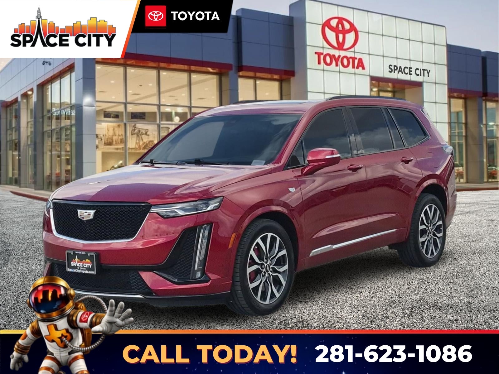 2023 Cadillac XT6 Sport in Radiant Red — front three-quarter view