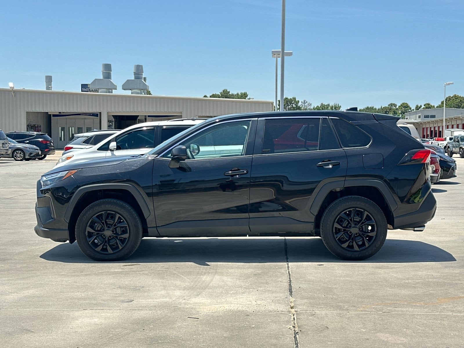 2025 Toyota RAV4 — rear three-quarter view