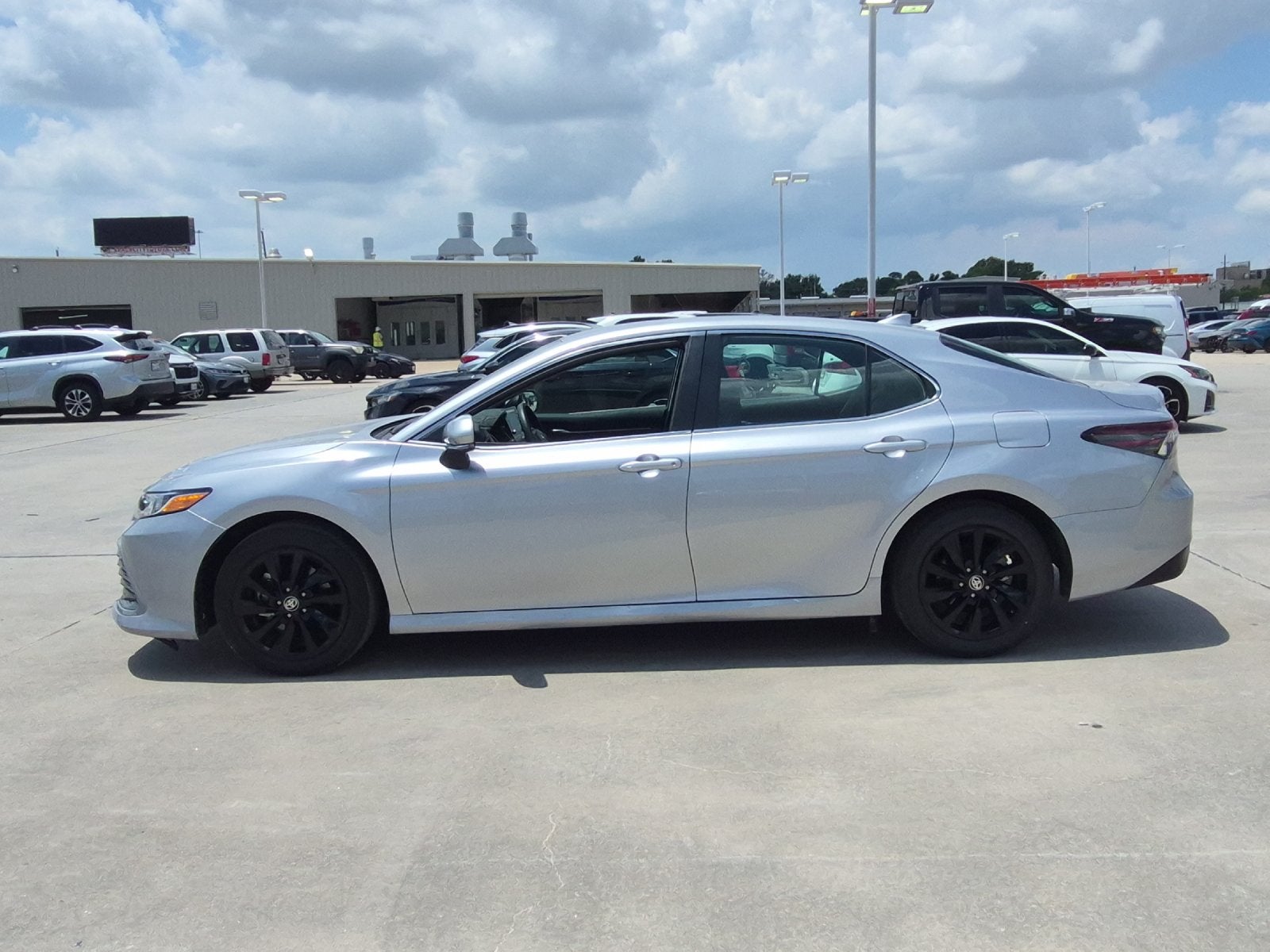 2024 Toyota Camry — rear three-quarter view