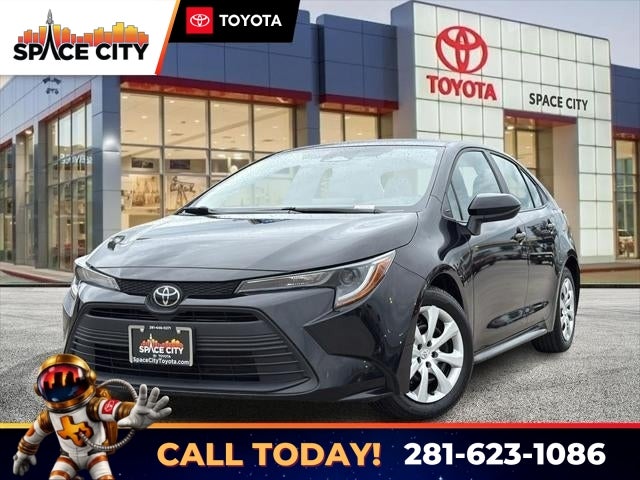 2024 Toyota COROLLA LE in Midnight Black Metal — front three-quarter view
