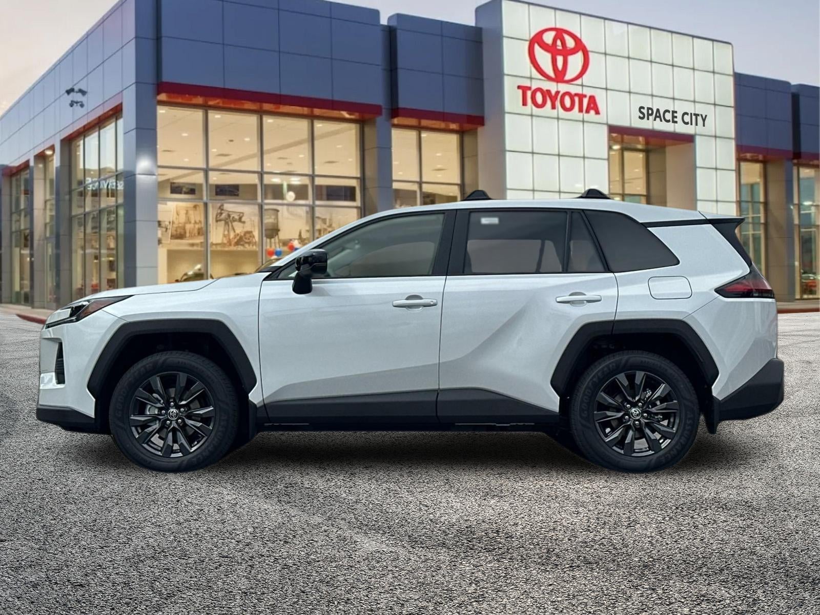 2026 Toyota RAV4 — rear three-quarter view