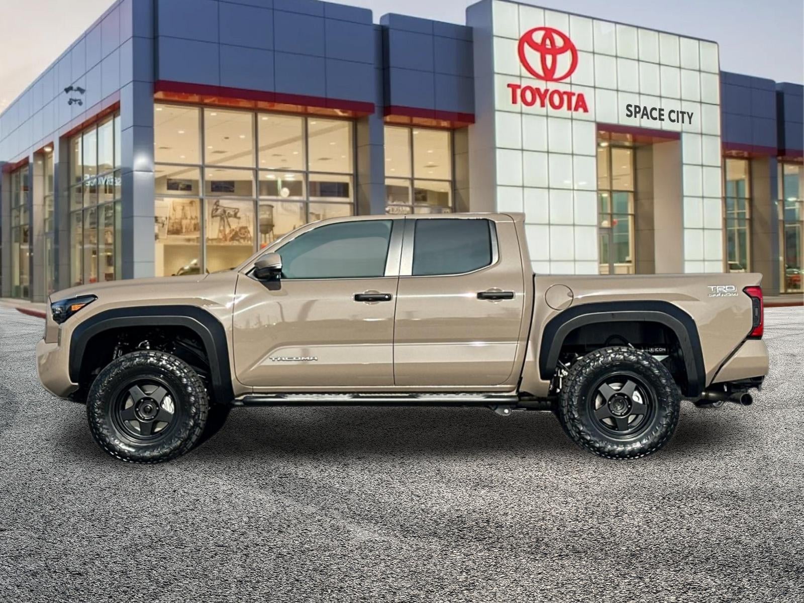 2026 Toyota Tacoma — rear three-quarter view