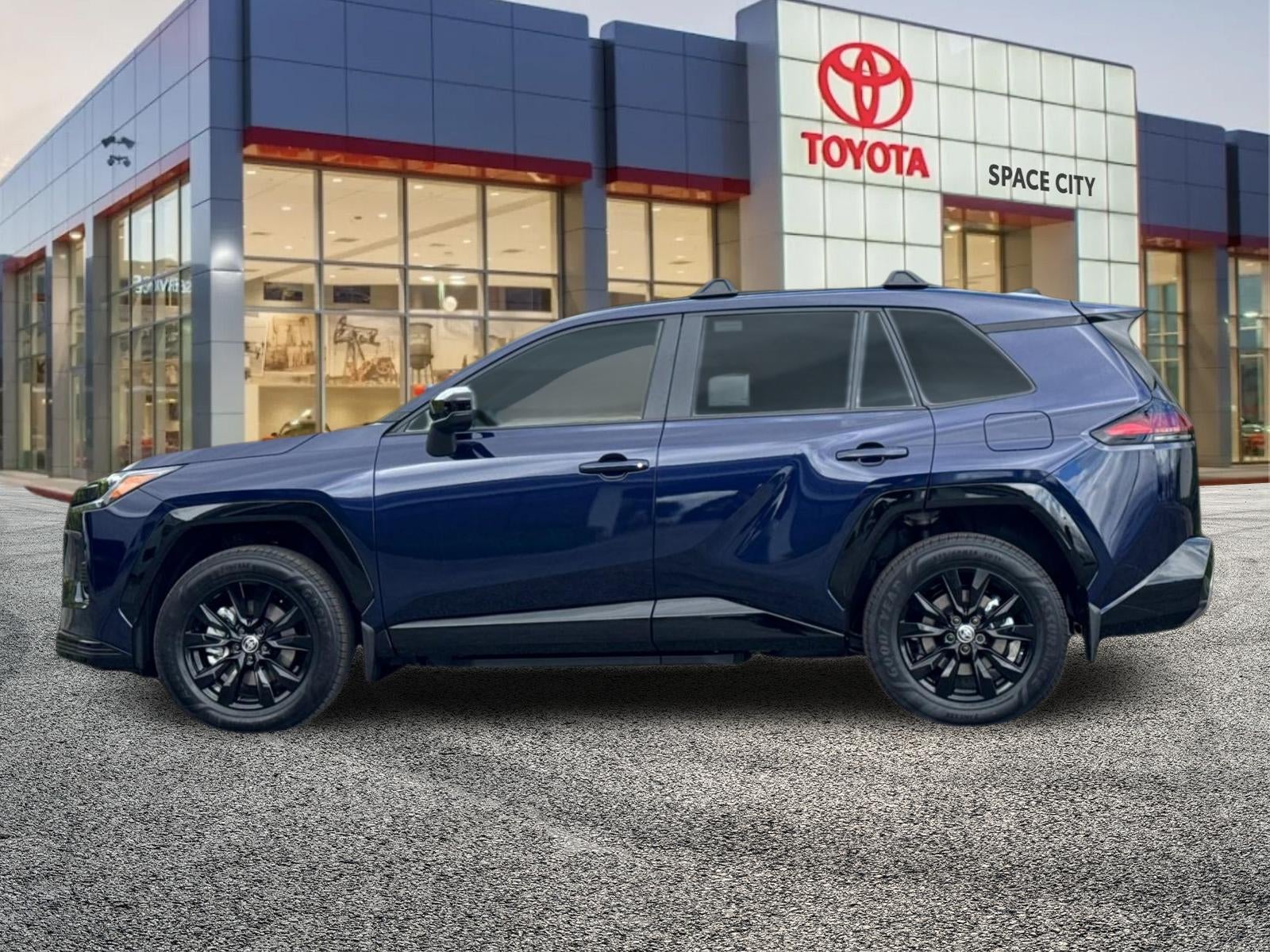 2026 Toyota RAV4 — rear three-quarter view